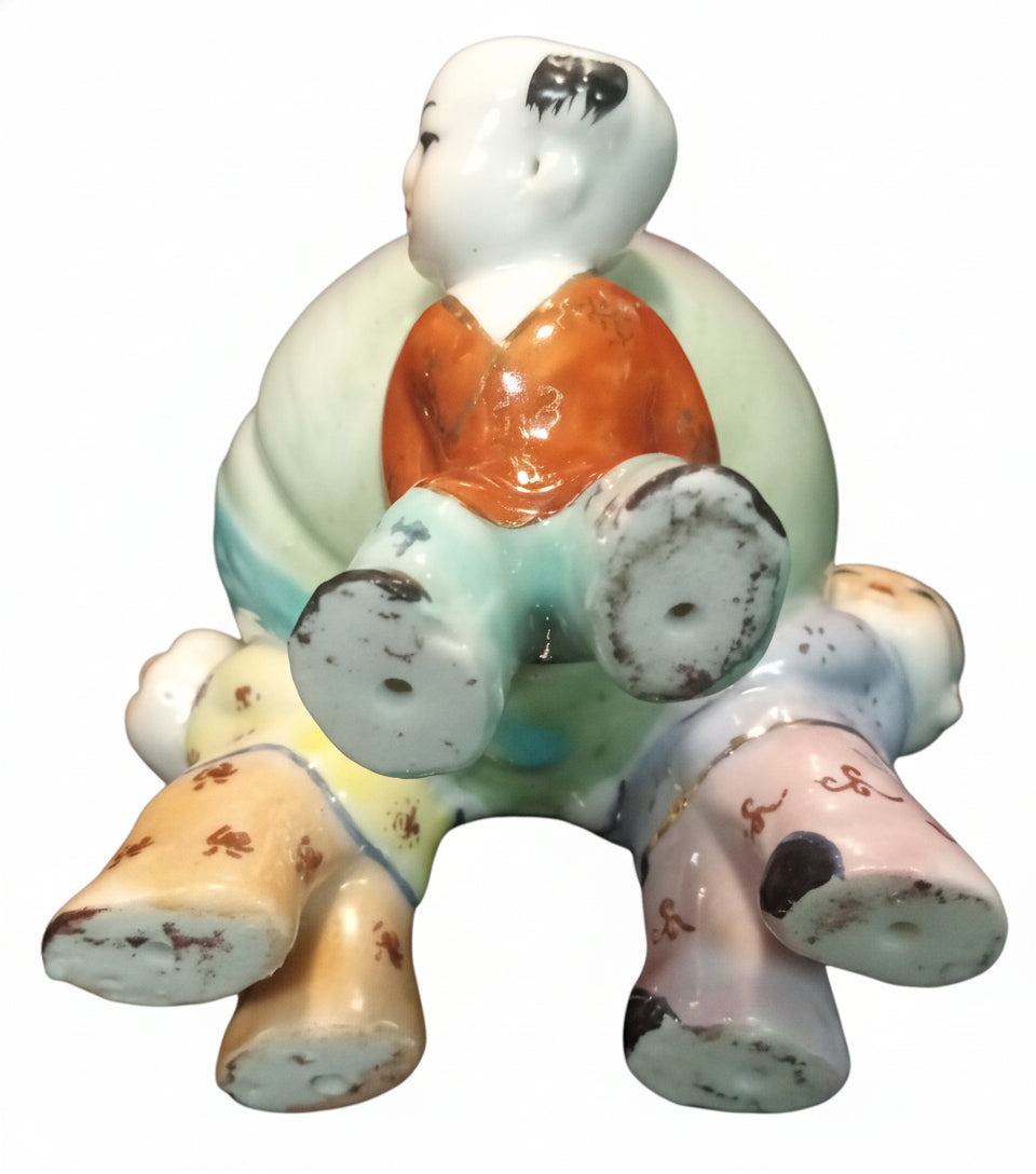 Chinese Porcelain Figurine by Andrea by Sadek depicts 3 boys holding a Longevity Peach 🍑